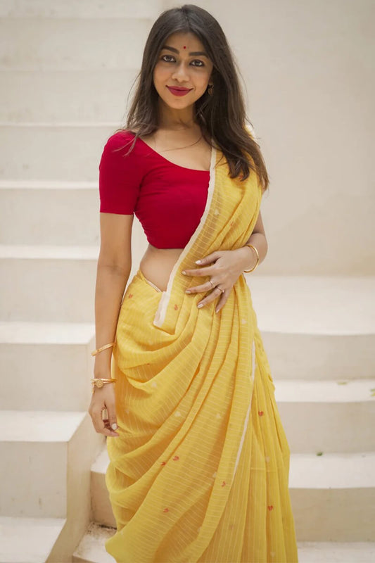 Winsome Yellow Cotton Silk Saree With Ethereal Blouse Piece