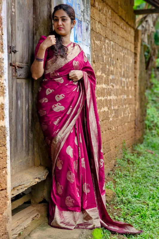 Elaborate Dark Pink Soft Silk Saree With Susurrous Blouse Piece