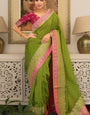 Pulsating Green Soft Silk Saree With Murmurous Blouse Piece