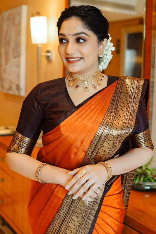 Ailurophile Orange Soft Silk Saree With Surreptitious Blouse Piece