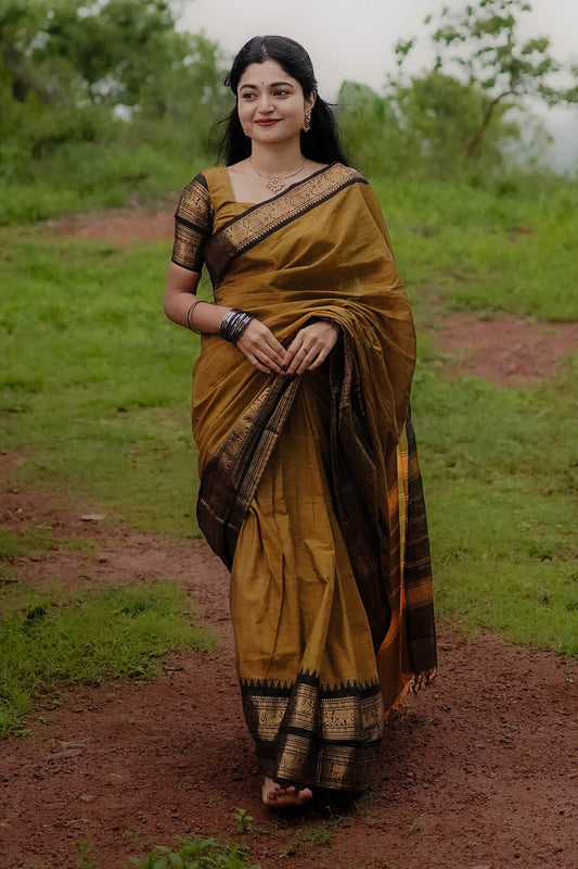 Elaborate Mustard Cotton Silk Saree With Dissemble Blouse Piece