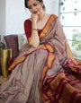 Twirling Grey Soft Silk Saree With Inspiring Blouse Piece