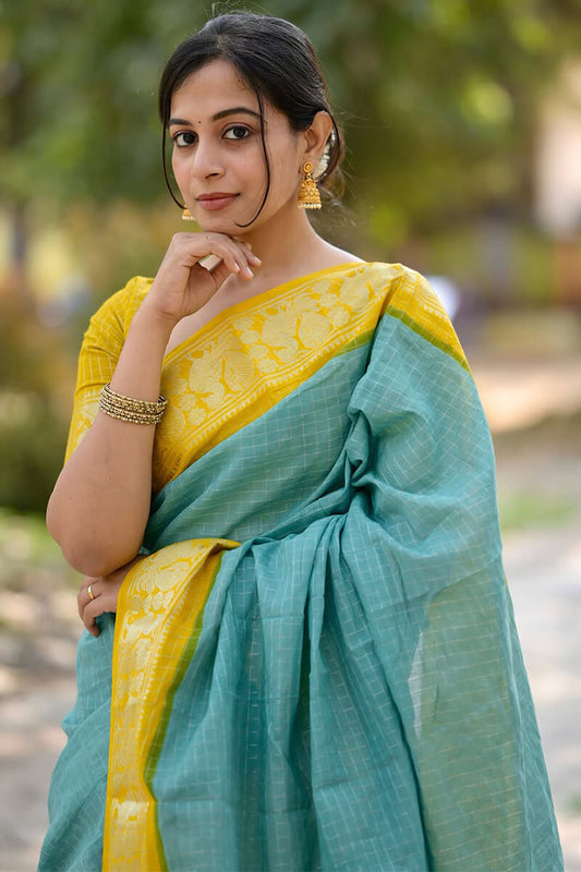 Traditional Firozi Soft Silk Saree With Breathtaking Blouse Piece