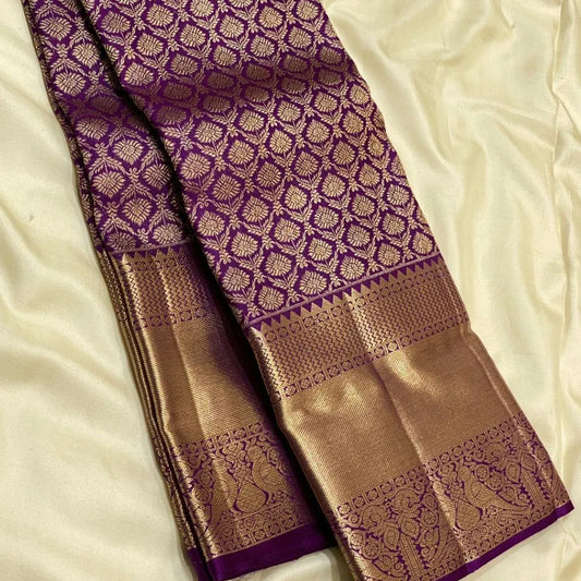 Dazzling Purple Soft Banarasi Silk Saree With Adorning Blouse Piece