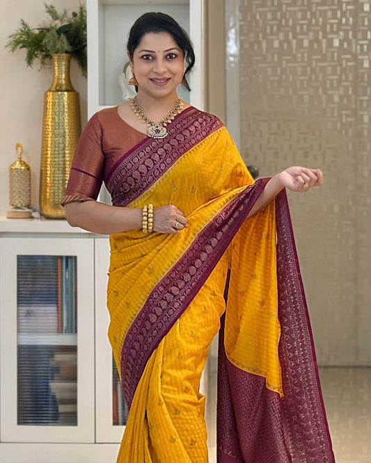 Surpassing Yellow Soft Silk Saree With Gleaming Blouse Piece