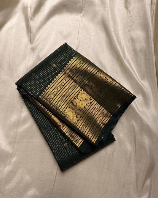 Angelic Dark Green Soft Banarasi Silk Saree With Intricate Blouse Piece
