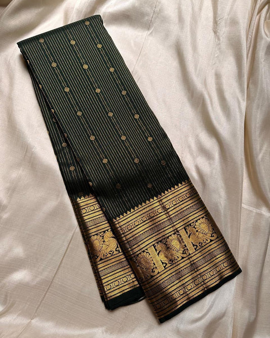 Angelic Dark Green Soft Banarasi Silk Saree With Intricate Blouse Piece