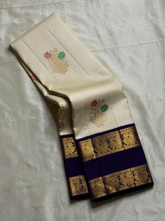Luminous Off White Pure Zari Weaving Banarasi Silk Saree With Eloquence Blouse Piece