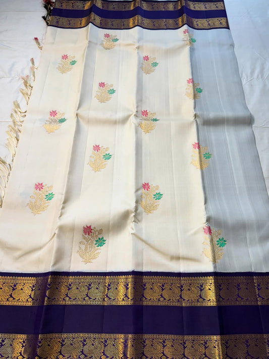 Luminous Off White Pure Zari Weaving Banarasi Silk Saree With Eloquence Blouse Piece