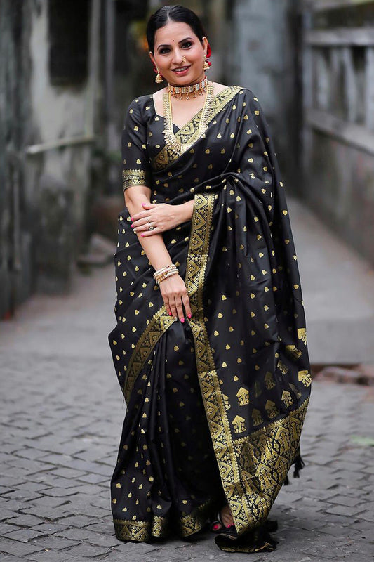 Stunner Black Soft Silk Saree With Demure Blouse Piece