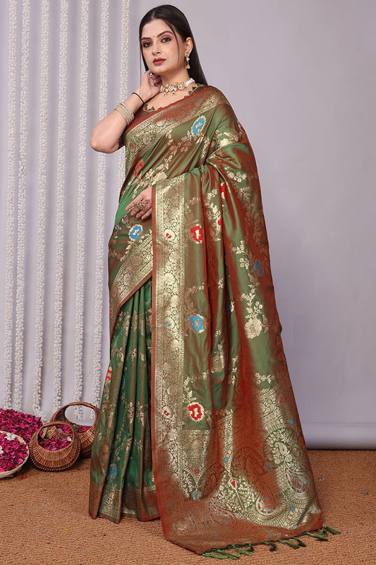 Entrancing Green Soft Banarasi Silk Saree With Quixotic Blouse Piece