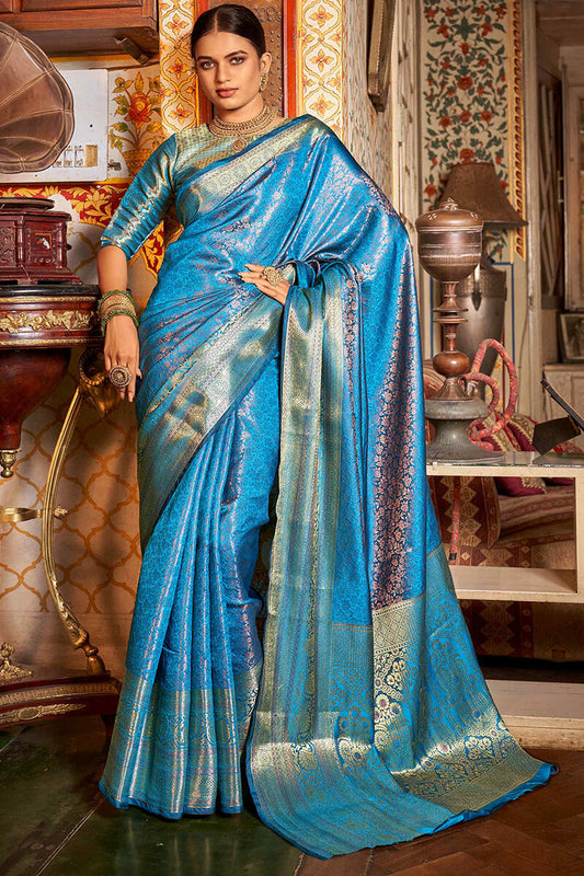 Surpassing Firozi Kanjivaram Silk Saree With Engrossing Blouse Piece