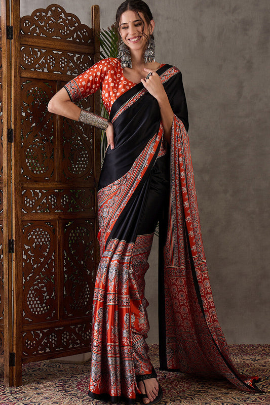 Ethnic Black Ajrakh Printed Semi Modal Silk Saree With Opulent Blouse Piece