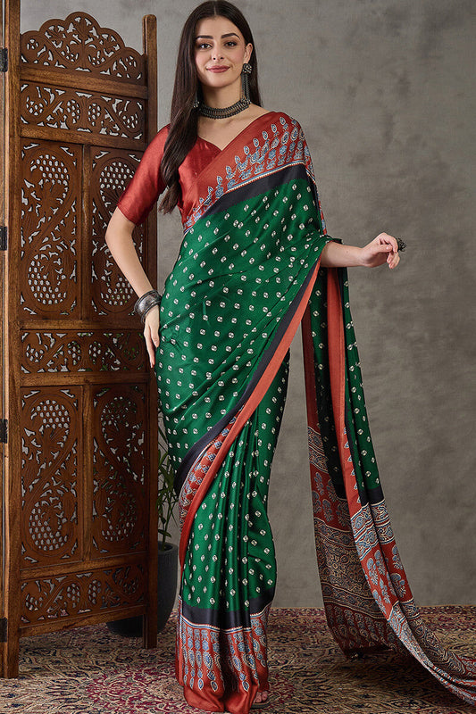 Mellifluous Dark Green Ajrakh Printed Semi Modal Silk Saree With Embellished Blouse Piece