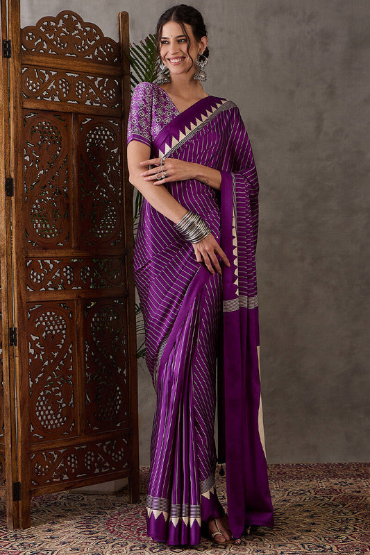 Engrossing Purple Ajrakh Printed Semi Modal Silk Saree With Denouement Blouse Piece