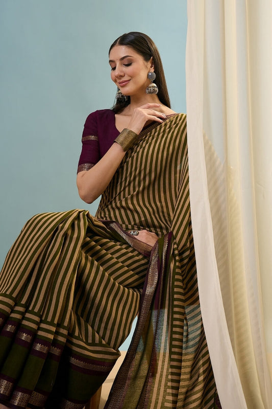 Mesmerising Green Printed Cotton Silk Saree With Flamboyant Blouse Piece