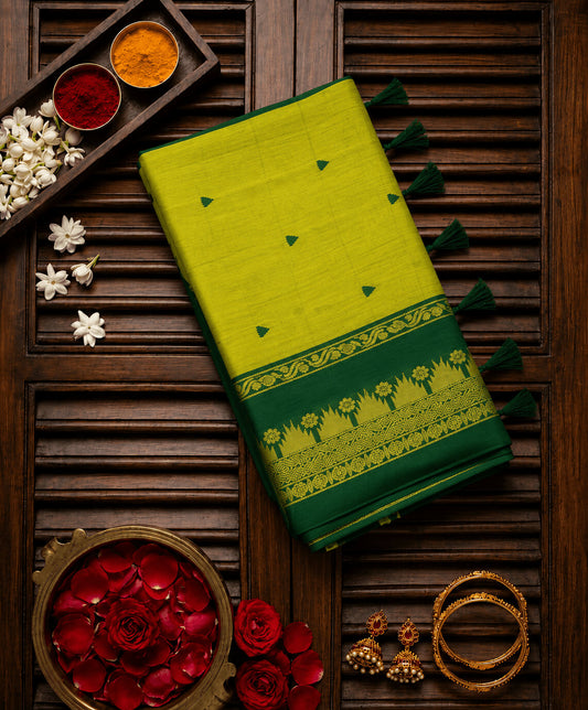 Mesmeric Green Cotton Silk Saree With Incomparable Blouse Piece