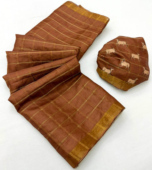 Cynosure Brown Printed Tussar Silk Saree With Unequalled Blouse Piece
