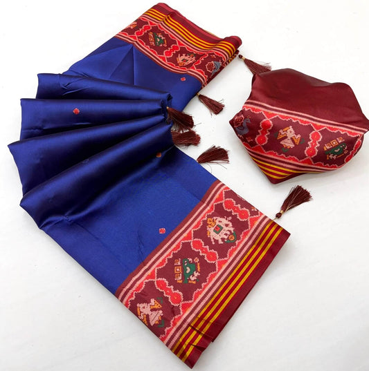 Engaging Royal Blue Printed Patola Handloom Silk Saree With Ratatouille Blouse Piece