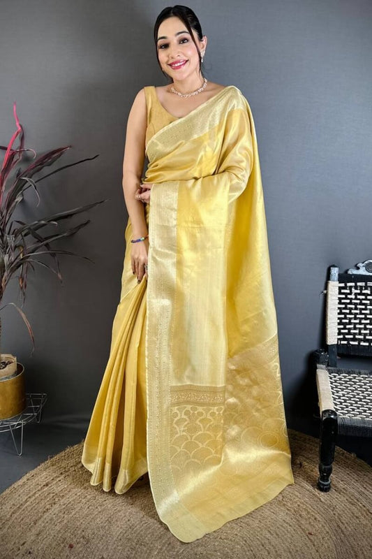 Unequalled Yellow Banarasi Tissue Silk Saree With Embrocation Blouse Piece