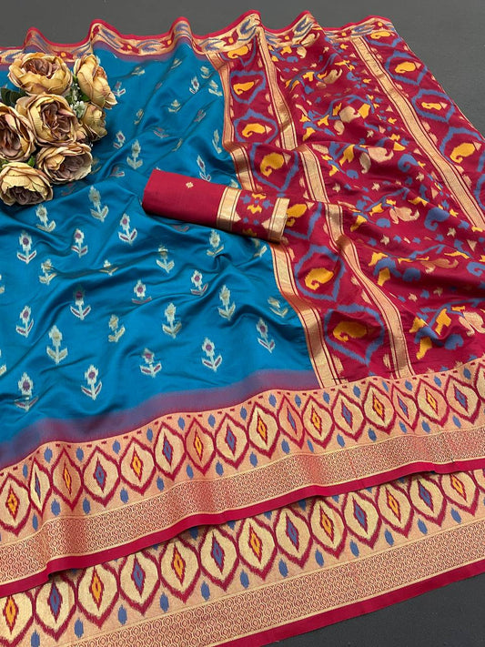 Outstanding Firozi Banarasi Ikkat Silk Saree With Ravishing Blouse Piece