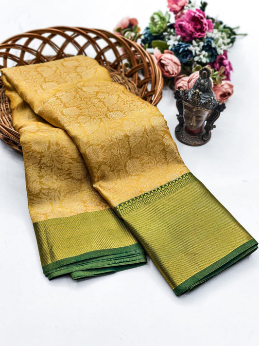 Alluring Golden Soft Tissue Silk Saree With Resonant Blouse Piece
