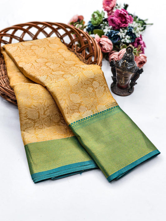 Forbearance Golden Soft Tissue Silk Saree With Murmurous Blouse Piece