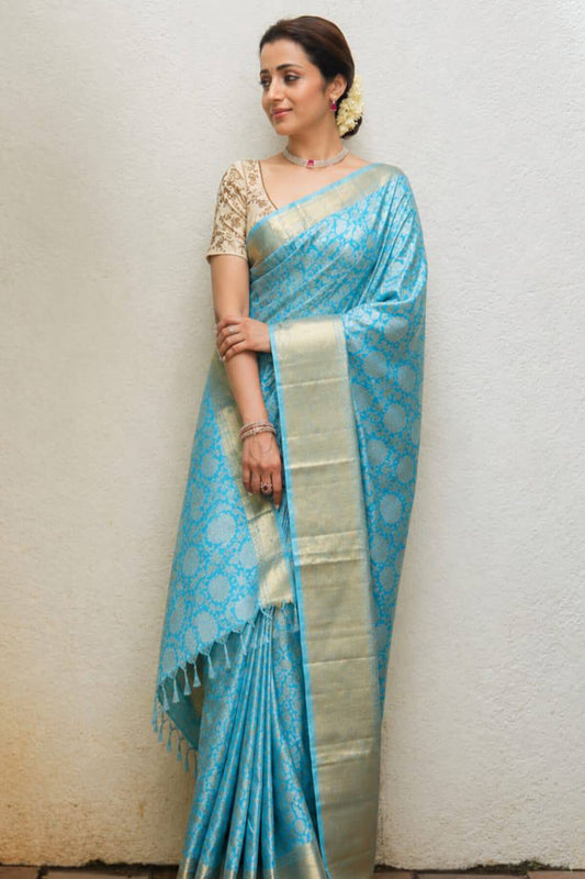Sizzling Firozi Kanjivaram Tissue Silk Saree With Adorning Blouse Piece