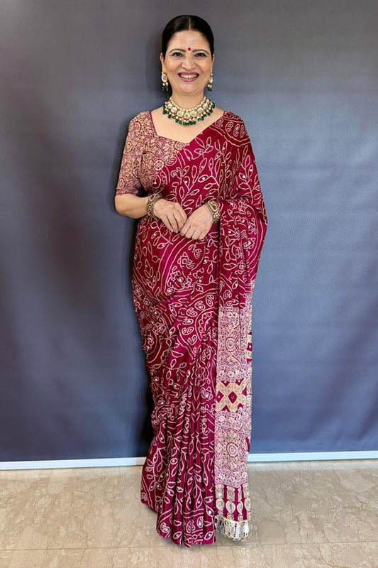 Magnetic Wine Ajrakh Printed Mirror Work Satin Silk Saree With Smashing Blouse Piece