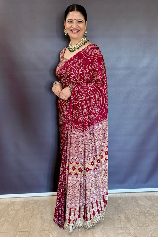 Magnetic Wine Ajrakh Printed Mirror Work Satin Silk Saree With Smashing Blouse Piece