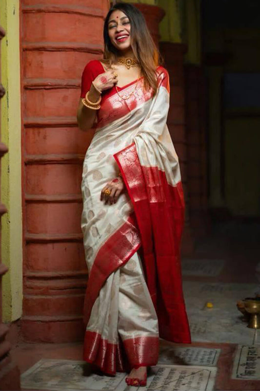 Staggering Off White Soft Silk Saree With Twirling Blouse Piece