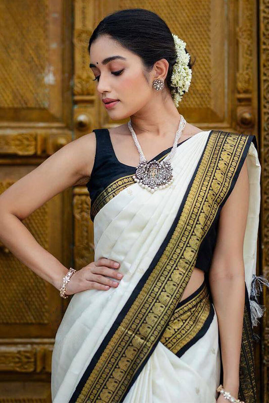 Denouement Off White Soft Silk Saree With Confounding Blouse Piece