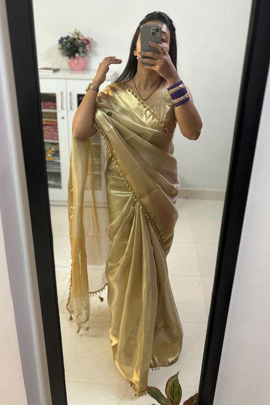 Splendorous Golden Soft Tissue Silk Saree With Artistic Blouse Piece