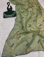 Elaborate Green Sequence Work Fandy Silk Saree With Gleaming Blouse Piece