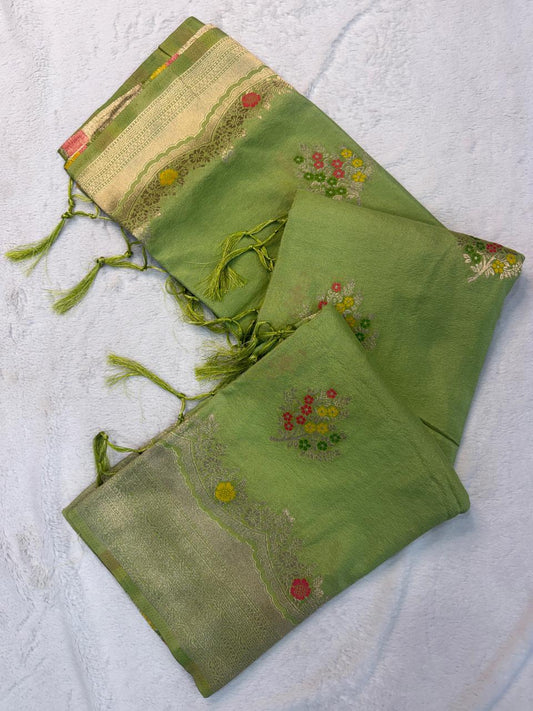 Prettiest Green Banarasi Georgette Silk Saree With Imaginative Blouse Piece