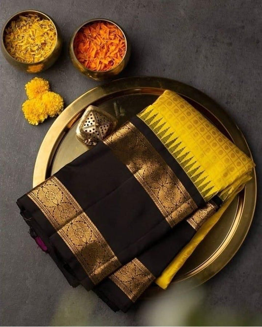 Sizzling Yellow Soft Banarasi Silk Saree With Magnetic Black Blouse Piece