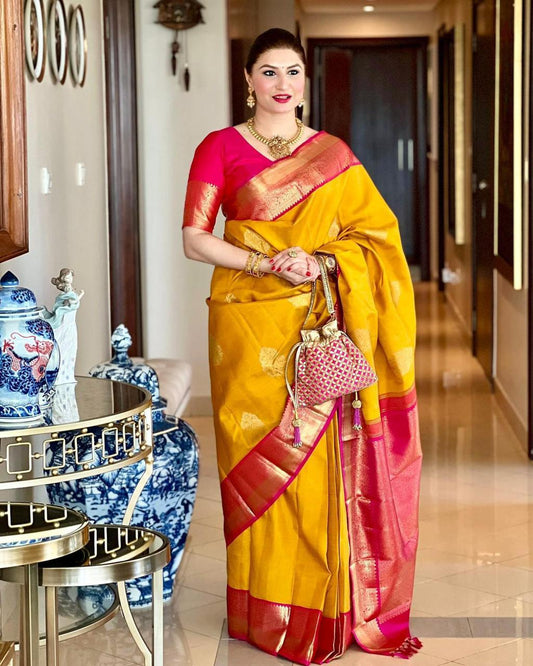 Dissemble Yellow Soft Banarasi Silk Saree With Blissful Blouse Piece