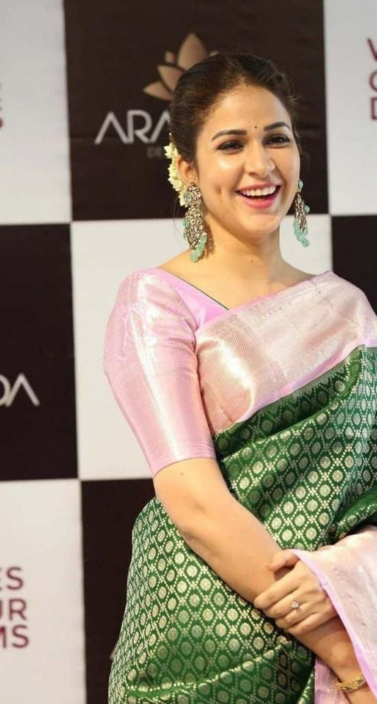 Elaborate Dark Green Soft Silk Saree With Redolent Blouse Piece
