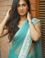 Blissful Firozi Soft Silk Saree With Brood Blouse Piece