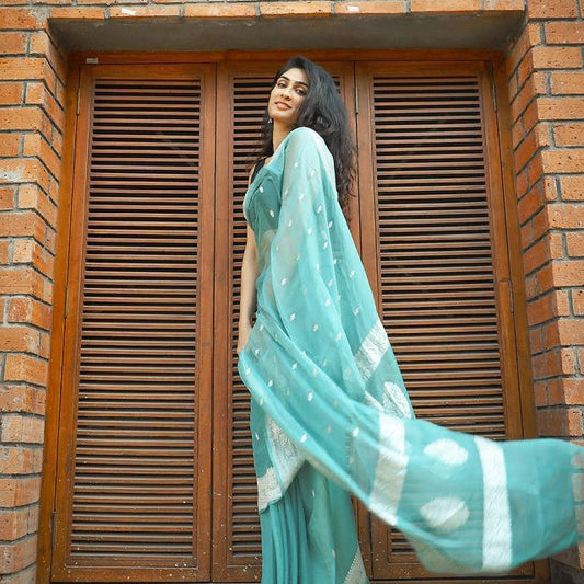 Blissful Firozi Soft Silk Saree With Brood Blouse Piece