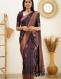Desiring Purple Soft Silk Saree With Engrossing Blouse Piece