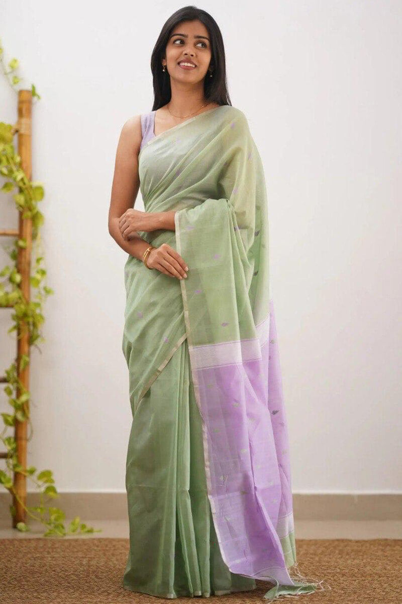 Elaborate Pista Cotton Silk Saree With Piquant Blouse Piece