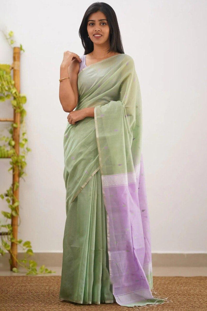 Elaborate Pista Cotton Silk Saree With Piquant Blouse Piece