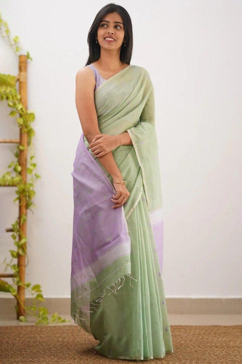Elaborate Pista Cotton Silk Saree With Piquant Blouse Piece