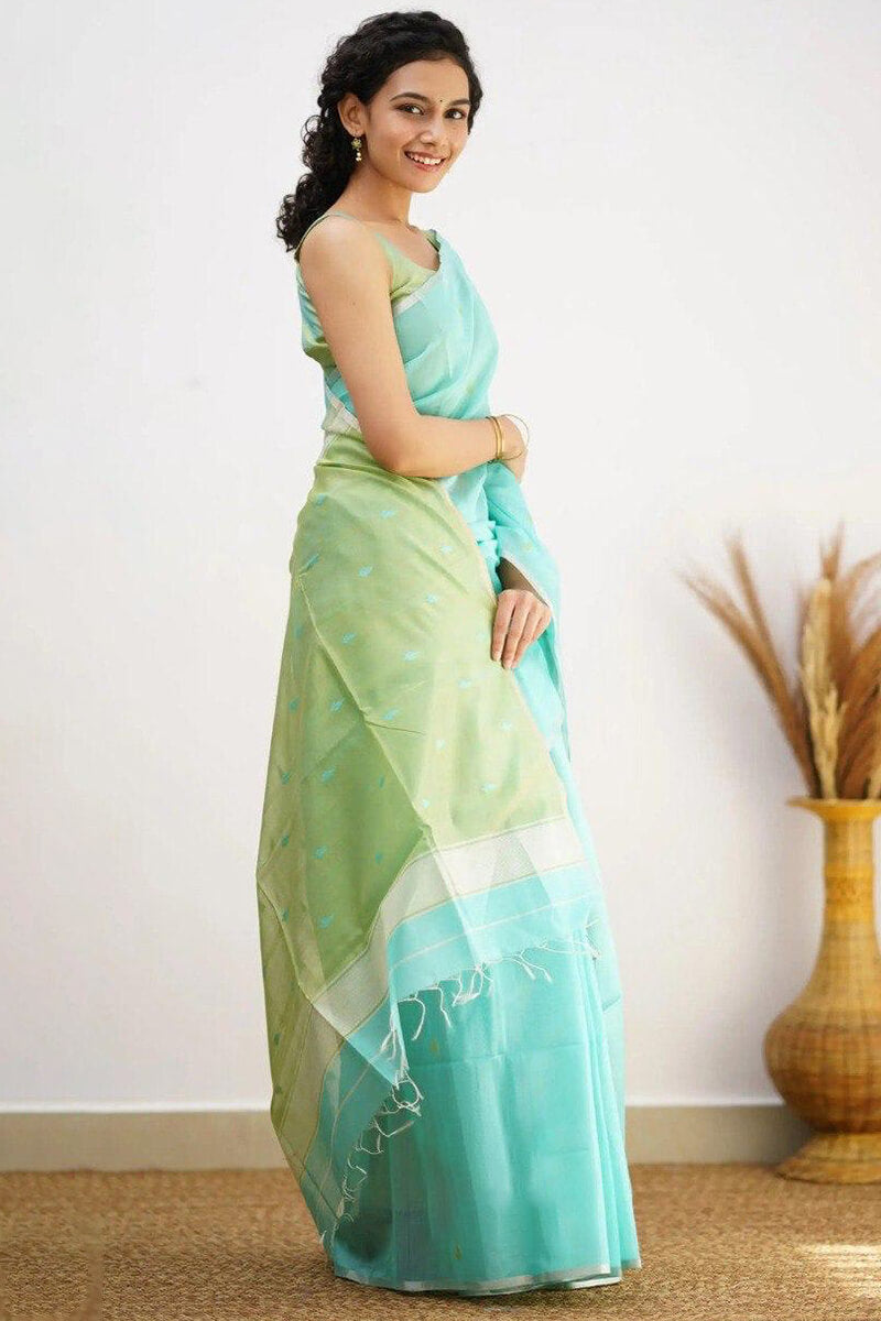 Divine Sea Green Cotton Silk Saree With Engaging Blouse Piece