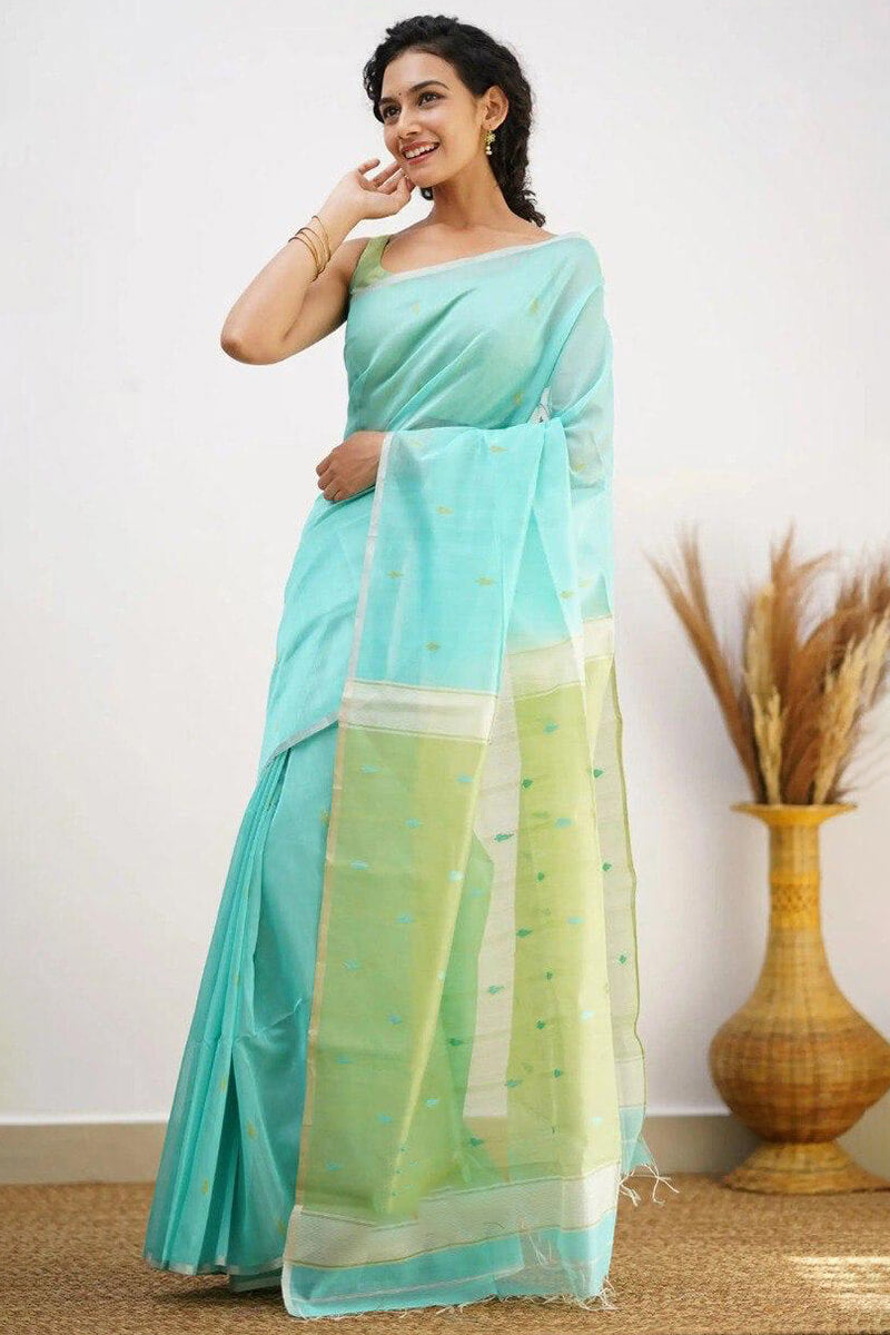 Divine Sea Green Cotton Silk Saree With Engaging Blouse Piece