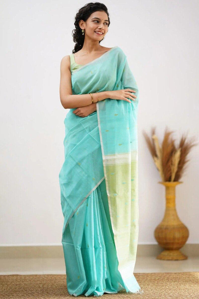 Divine Sea Green Cotton Silk Saree With Engaging Blouse Piece