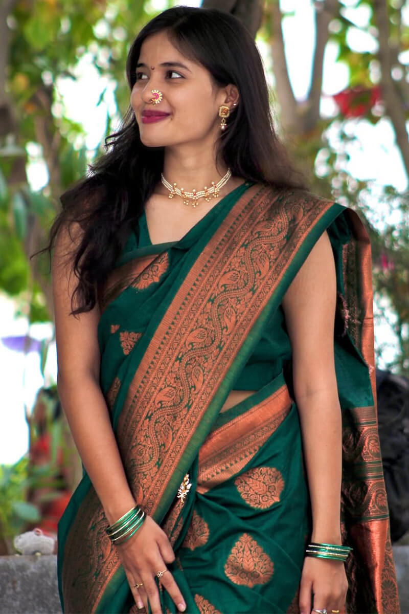 Enigmatic Dark Green Soft Silk Saree With Invaluable Blouse Piece