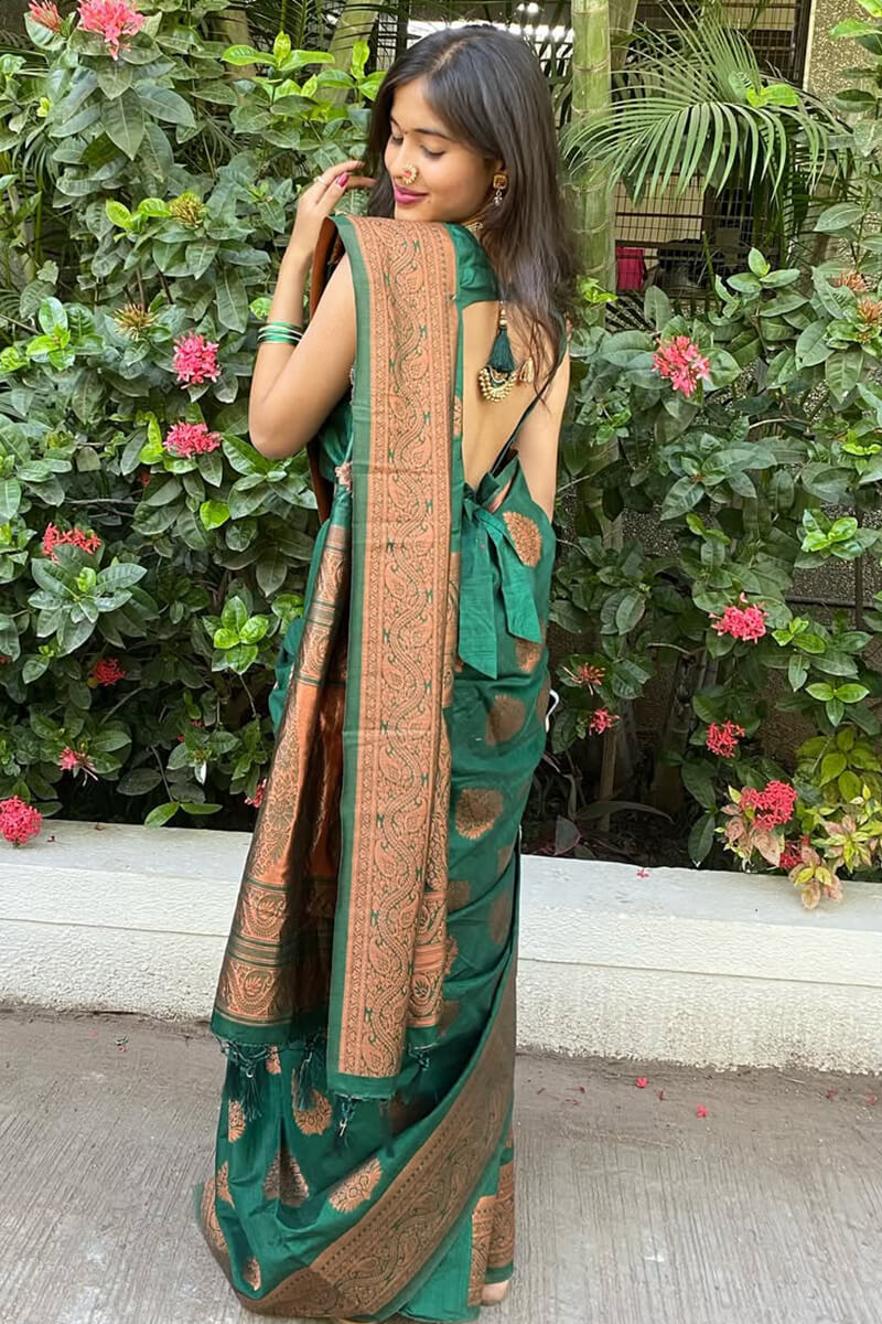 Enigmatic Dark Green Soft Silk Saree With Invaluable Blouse Piece