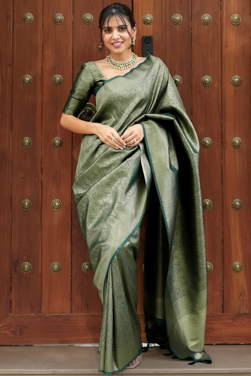 Adorable Dark Green Soft Silk Saree With Beguiling Blouse Piece